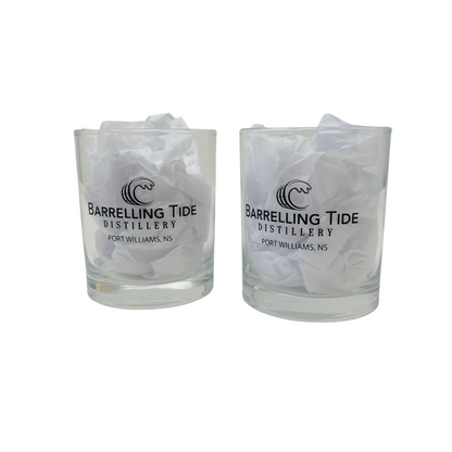 Two clear rocks glasses with the &